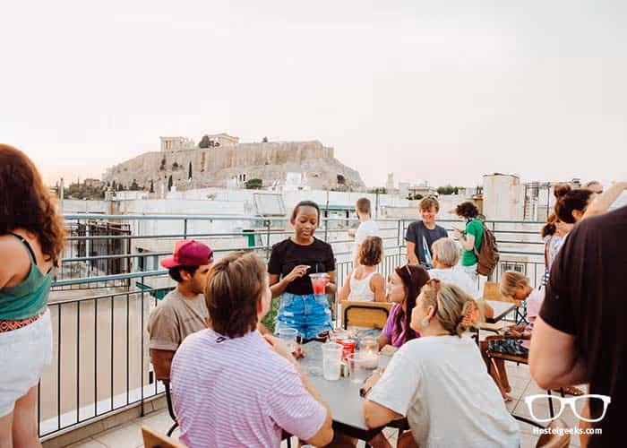 Athens Backpackers hostel rooftop with Acropolis views at night