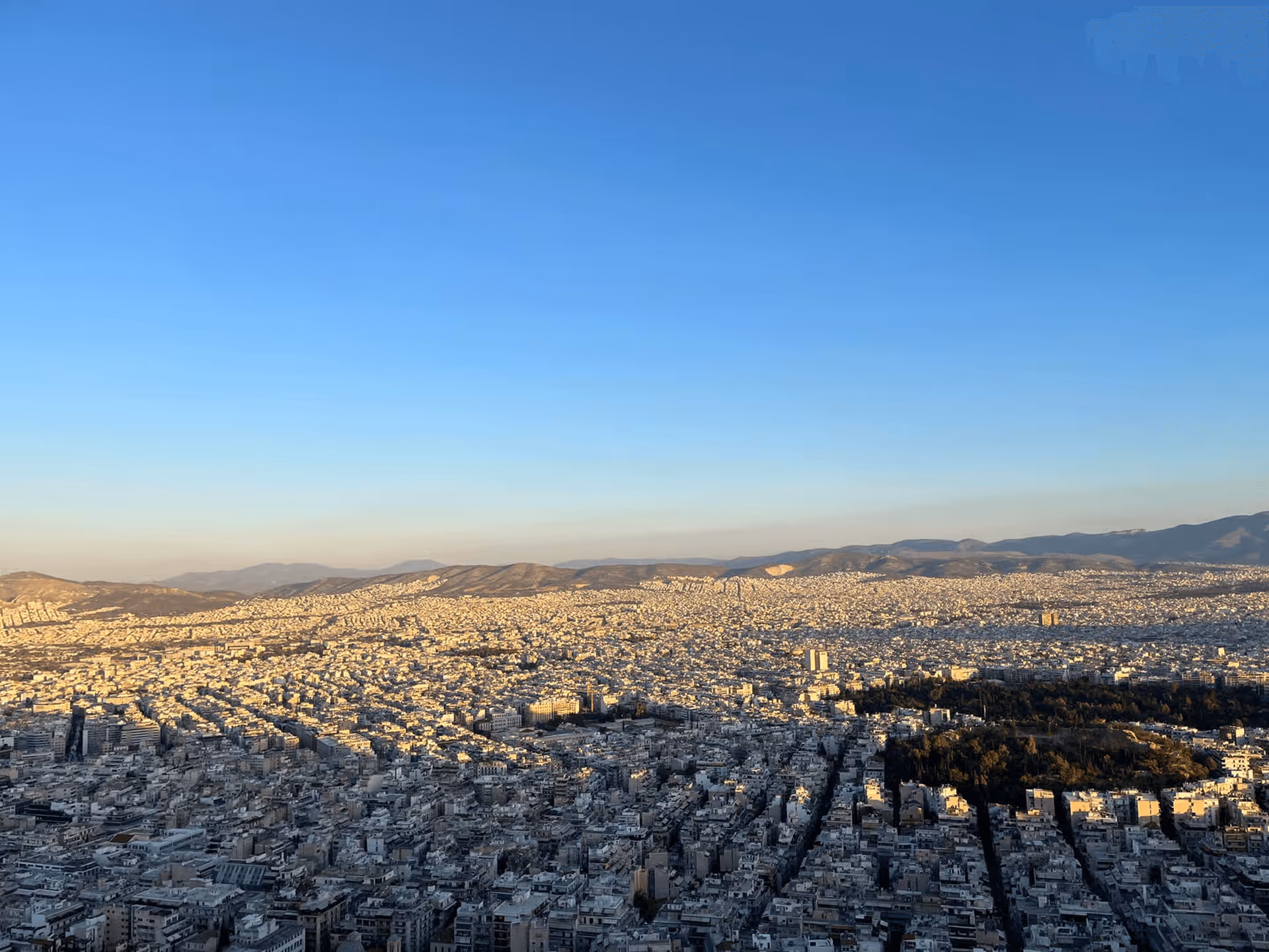 360-degree panoramic view from Lycabettus Hill summit showing Athens skyline and Aegean Sea